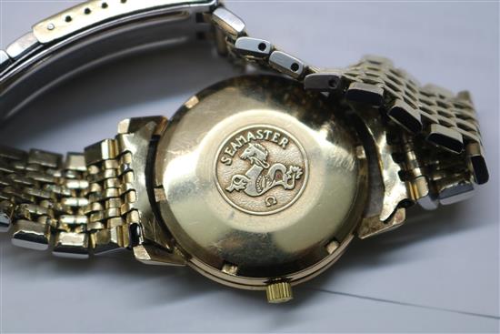 A gentlemens 1960s 9ct gold Omega automatic Seamaster wrist watch, on gold plated Omega bracelet,